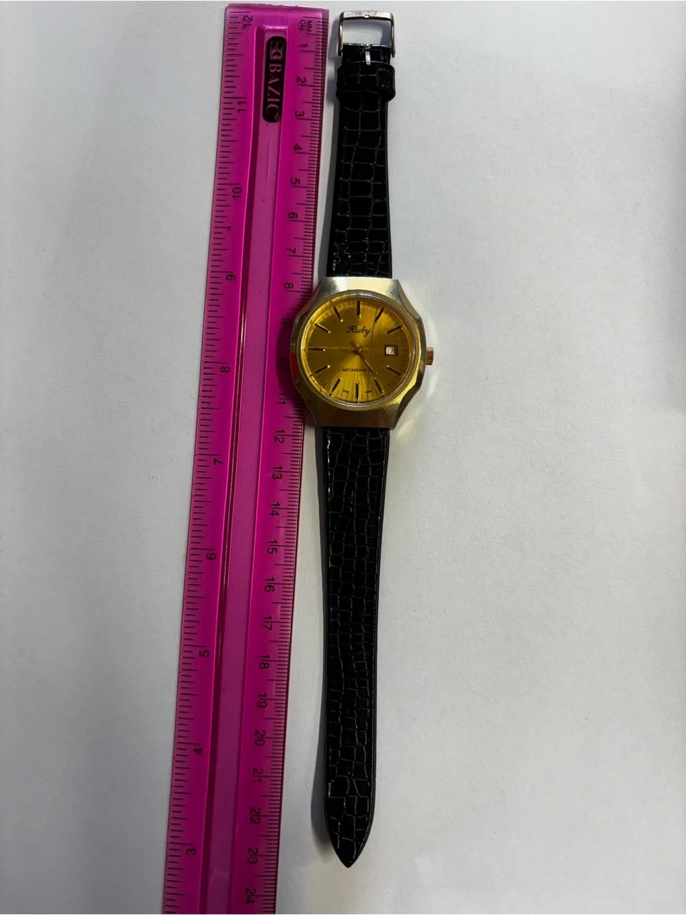 Gold-Tone Watch with Black Leather Strap